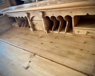 Wood breakfront with hidden pull-out desk