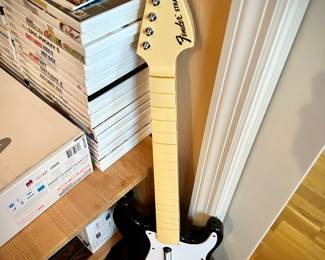 Wii games, drums, and guitar