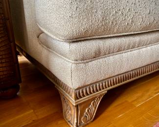 2 off-white Bernhardt sofas with wood trim and over-sized coffee table