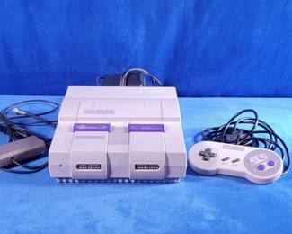 Super Nintendo Entertainment System w/controllers and carry bag