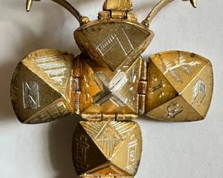 9 Karat Gold Globe Pendant On Chain, Opens To Reveal Etched Symbols
Lot #: 37