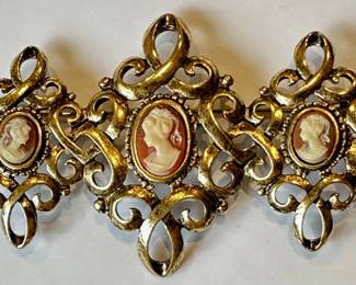 Antique Ornate Gilt Bronze Brooch Pin With 3 Natural Shell Cameos
Lot #: 36