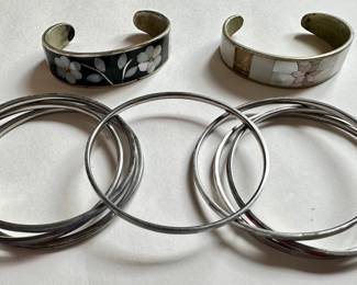 7 Vintage Mother Of Pearl Bangle Bracelets & 2 Mother Of Pearl Cuff Bracelets
Lot #: 89