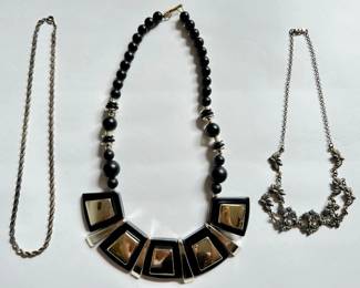 3 Vintage Necklaces: Chunky Bib, Silver Tone Chain & Acorns Matching Earrings In Lot 109
Lot #: 119