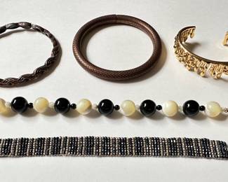 5 Vintage Bracelets: Gold Tone Drip, Robert Rose Bangle, Beaded & More
Lot #: 134