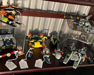 Lego Agents 8969 4 Wheeling Pursuit Includes Truck, Slime Chopper & Baracade ($35), Lego 1728 Aquazone Aquanauts Crystal Crawler ($24), Lego Agents Jet Ski with Mini Only ($6), Lego Agents 8968 Mountain River Heist Boat and Mini Only ($10), Lego Agents 8630 GoldHunt Mission & Supersonic Jet Only, Incomplete Set ($20), Lego Agents 8633 Speedboat Rescue Includes Speedboat, 2 Sharks, & 3 Missile Minis, Incomplete Set ($95) 
