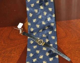 Stunning Brioni Silk Tie ($50) Shown with a Woman’s Movado Museum Watch ($50)