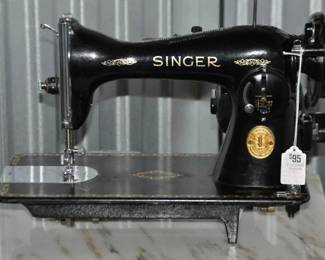 Vintage Singer Sewing Machine that is Classic and in Working Condition, Serial No. JC23151G, ($95). 