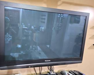 one of several Flatscreens with surround sound , some with Fire Stick