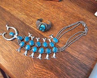 costume and Sterling jewelry, the squash blossom is high end costume but there is Sterlin and Turquoise pieces too