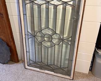Large beveled glass window.