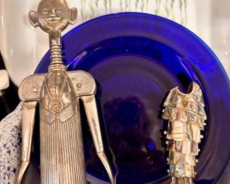 Vintage Italian Pierre Le Sommelier wine bottle opener and abalone fish bottle opener.