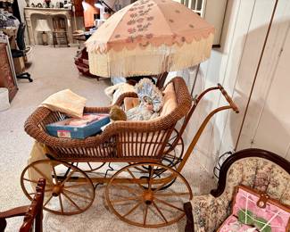 Wicker baby pram.