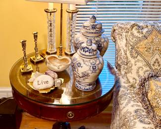 Antique round side table with glass top.