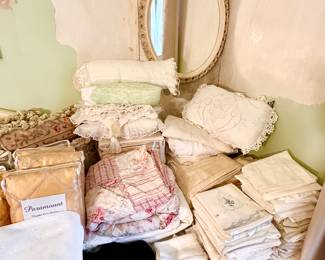 Embroidered pillowcases & linens.