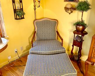 Beautiful custom upholstered armchair and ottoman.  