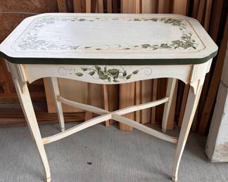 Cute  little hand painted wood table.