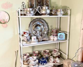 Silverplate tea & coffee sets.