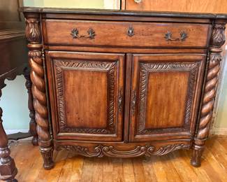 Brand new carved wood cabinet with marble top.