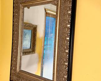 One of two large matching mirrors.