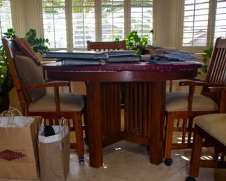 Beautiful wooden dining table and chairs with wheels(x4)
