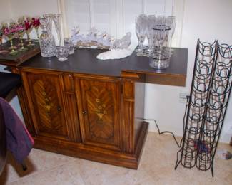 Beautiful intricate server and glassware with wine rack 