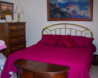 King size bed, cedar lined end of bed storage, intricate wooden dresser