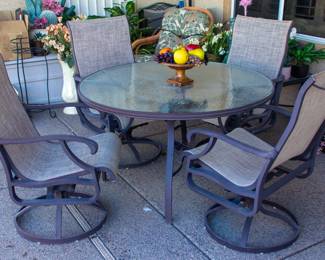 Glass top outdoor table and chairs(x4)