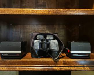 Polaroid camera and binoculars