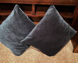Two large dark blue pillows