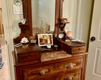 Antique dresser with mirror and candle shelves