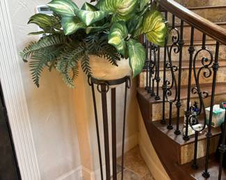 Metal plant stand and greenery