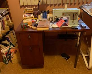 Singer sewing machine and table.  Sewing items