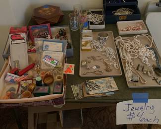 Doll house and jewelry items.  