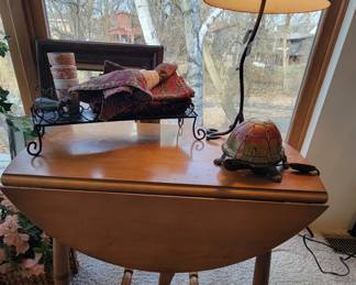 1 of 2 smaller drop-leaf tables