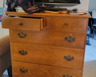 There is another larger TV for sale as well