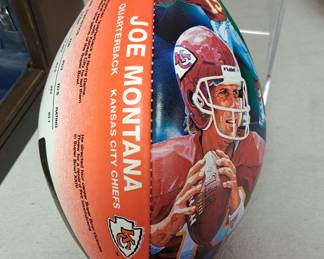 Sports collectibles. "Joe Montana Kansas City Chiefs" collectors signed football.