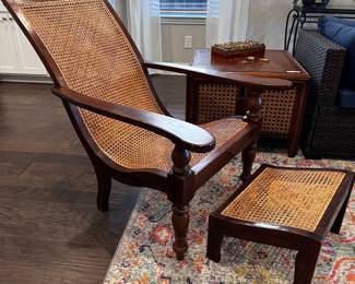 British colonial type chair and ottoman.
Caning in good condition.