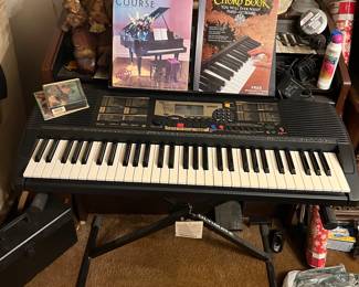 Awesome keyboard in front, electric organ behind. 