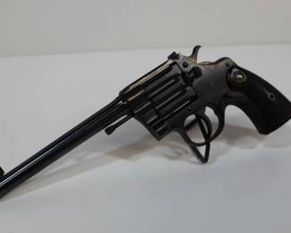 Rare Colt Camp Perry .22 Caliber Target Pistol Made by Colt Firearms Company in 1931 with roughly 2500 made. Blued finish 8" round barrel with factory pinned large blade target front sight, "CAL 22 LONG RIFLE" and "CAMP PERRY" markings, and Colt 2-line address. Blued swing out single shot frame with Rampant Colt, plain trigger, and knurled grip. Standard checkered walnut Rampant Colt emblem stocks. This one in very nice condition with 95 % plus factory blue finish present. Overall a rare opportunity to purchase a rare gun!! ser# 2108   **ATF LAWS APPLY**