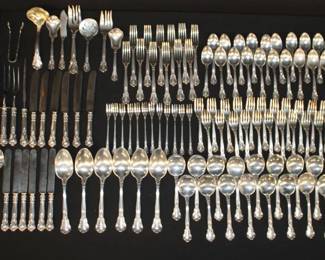 148 pcs Gorham Chantilly Sterling Silver Flatware Patented in 1895; 12-7 3/8" Spoons (311.8 grams), 12-7" Forks (490 grams), 12-5 3/8" Cocktail Forks (155.4 grams), 24-5.75" Forks (687 grams), 38-6" Spoons (973.4 grams), 18-6 9/16" Soup Spoons (715 grams), 6-8 3/8" Spoons (464.3 grams), 9pc Serving Pieces (407.2) -- Weighted - 11pc Carving & Knife Sets (683.7 grams), 6pc 8 3/16" Knives (346.9 grams) --4,204.1 grams ---- Weighted Grams = 1,030.6 grams SOME ARE MONOGRAMMED
