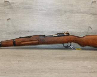 Iranian Model 49 Mauser Carbine, A rare non import Iranian model 49 Mauser Carbine in super high condition. Appears unissued and just about in mint untouched condition. . 7.92 mm Mauser, 38" total length. NSN   **ATF LAWS APPLY**