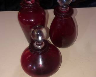 Red Bottles in 3 Different Sizes