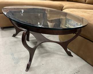 Arhaus metal base with swan legs and oval glass top