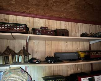 One shed with Assortment of G scale, trains