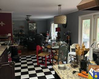 Kitchen, full of all kinds of items, including a icemaker