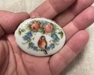 old porcelain brooch