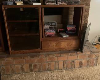 Entertainment center dvd vhs books