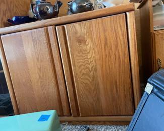 Storage cabinet oak swinging doors