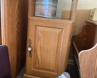 End table with shelves and cabinet doors